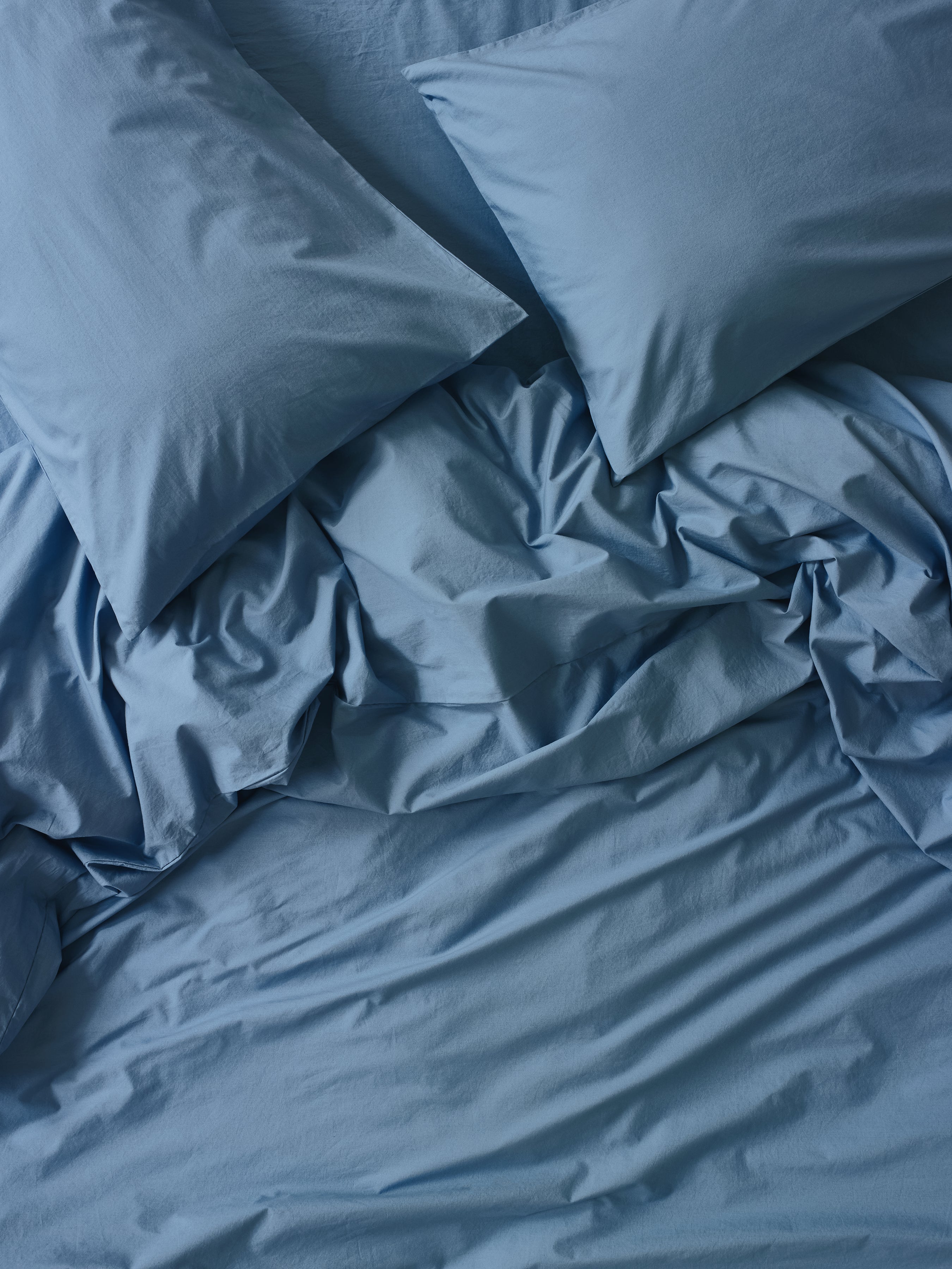 WASHED_COTTON_PERCALECOVE_BLUE_OVERHEAD_14.43.30_copy.jpg